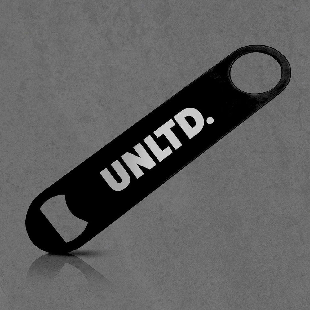 Black bottle opener with 'UNLTD.' text on a gray background